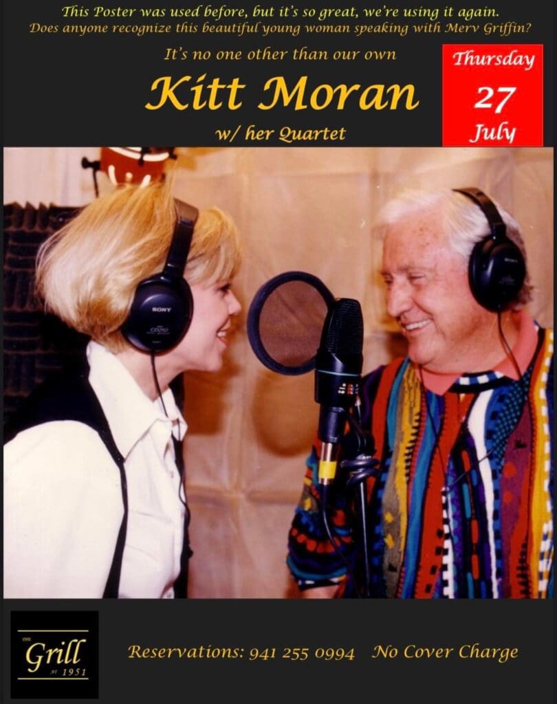 A woman and an older man wearing headphones.
